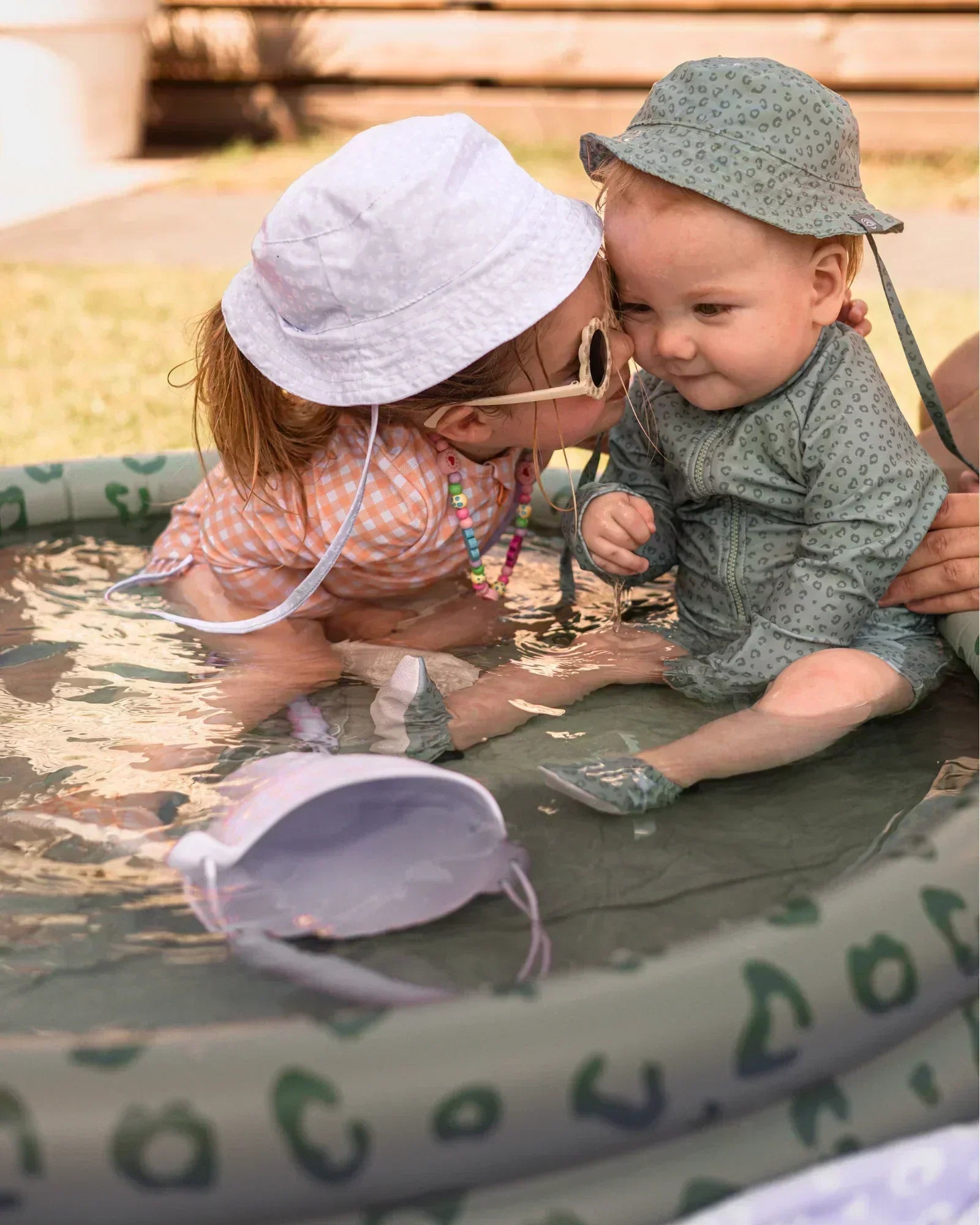 children wearing matching swimwear