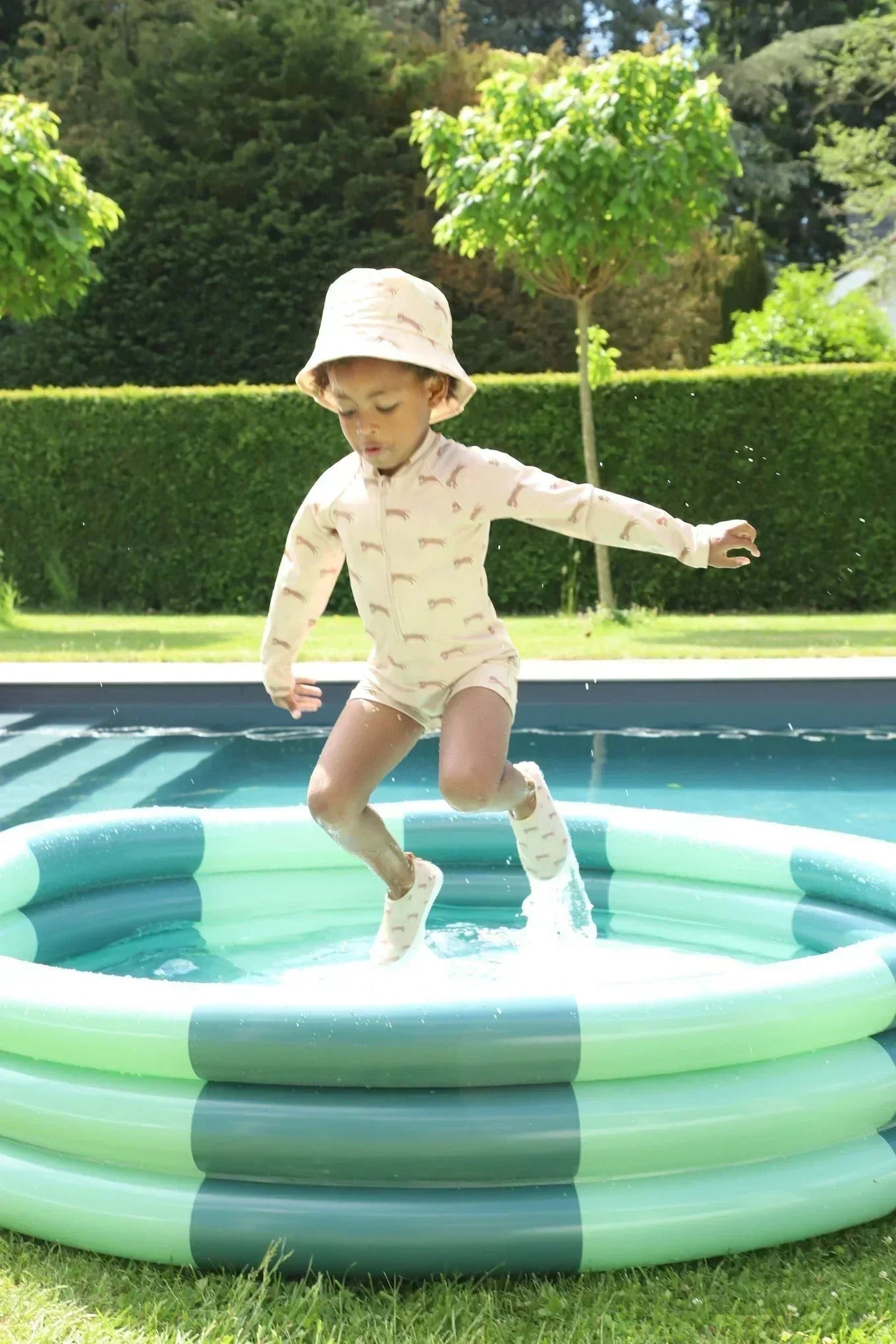 child with uv protection swimwear
