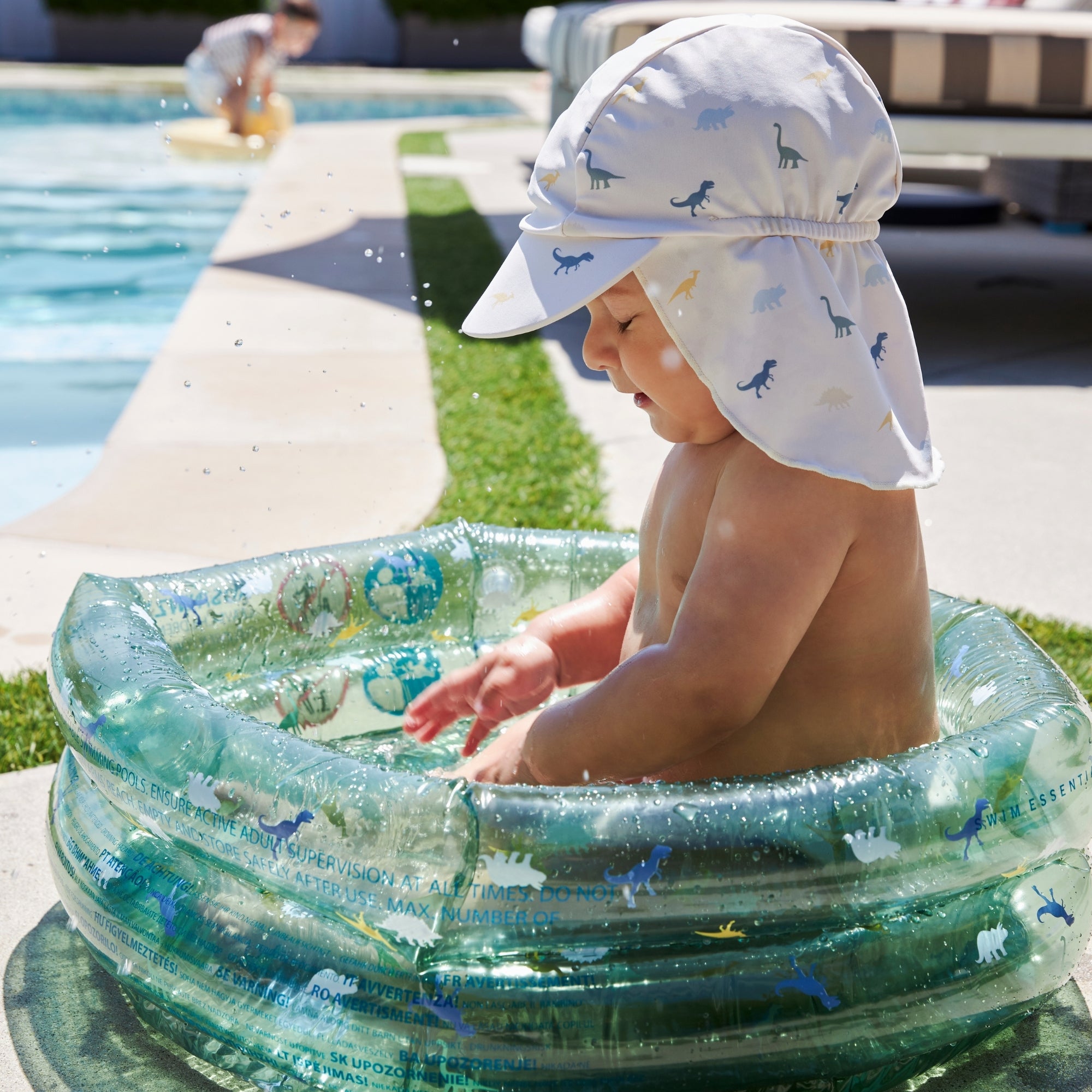 Gorro con protección UV en cuello - Multicolor - Dino