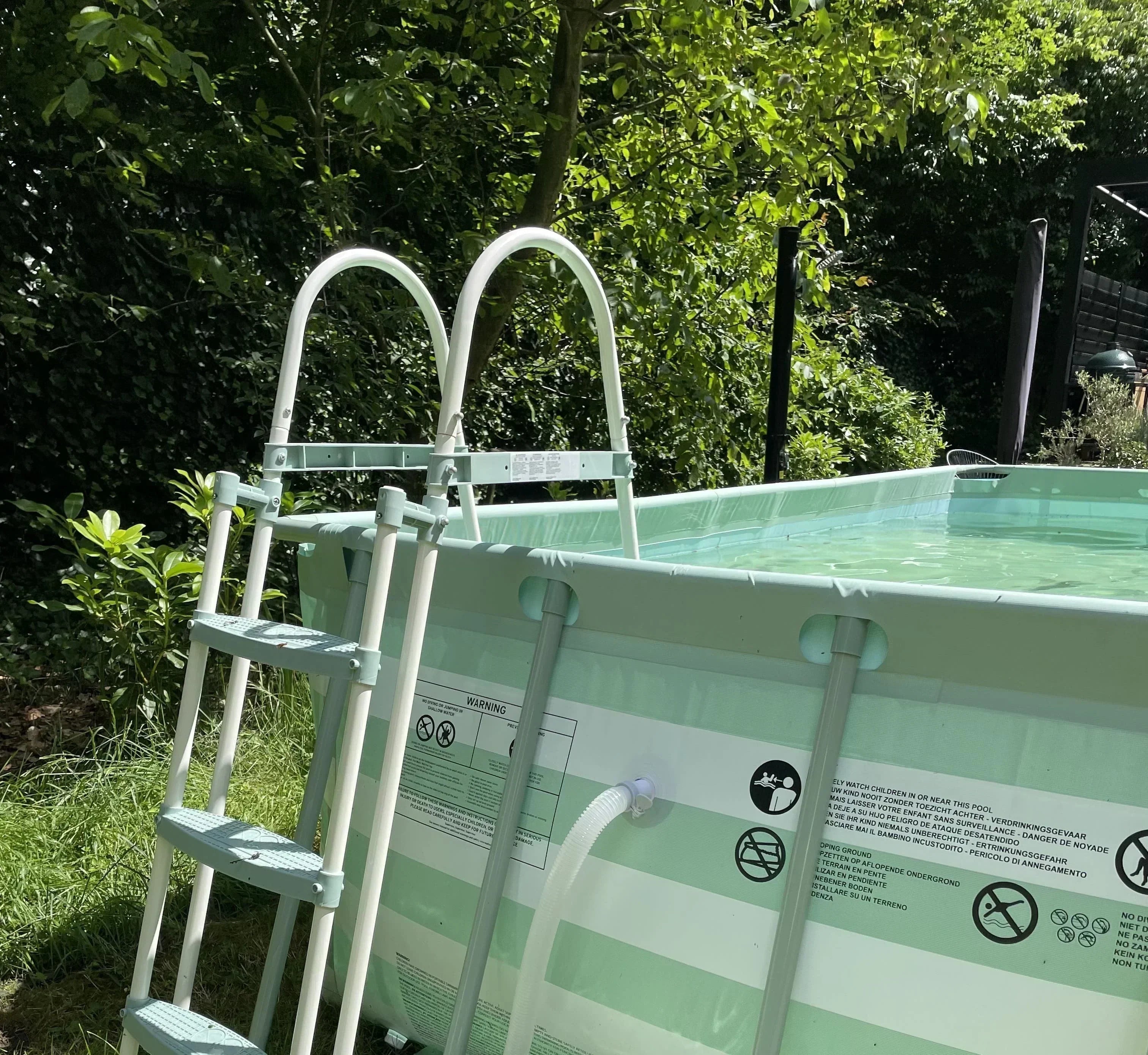 pool with stairs in garden