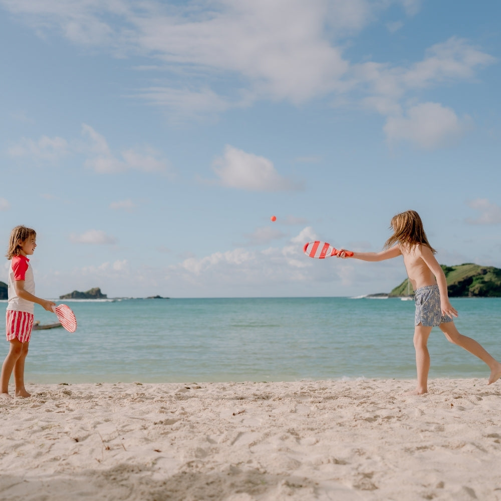 children playing on the beach