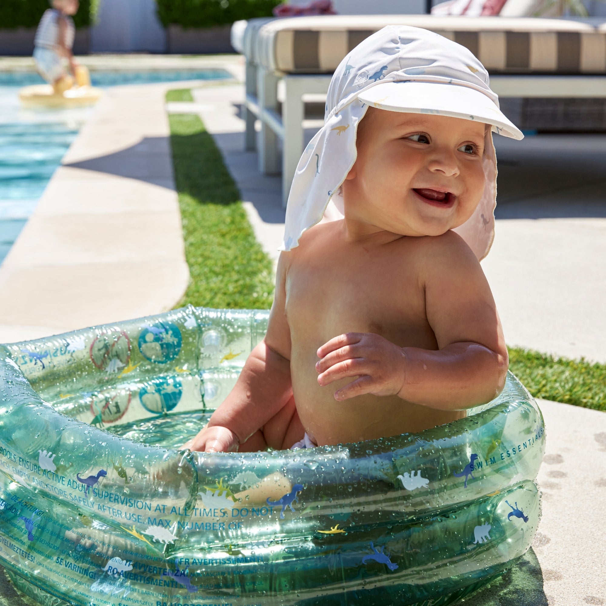 Gorro con protección UV en cuello - Multicolor - Dino